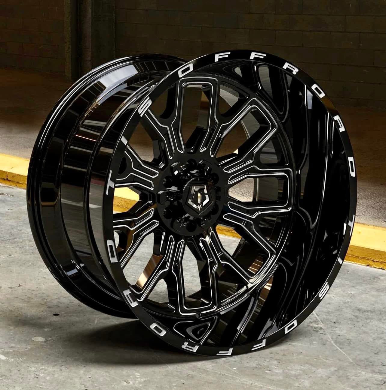 22X12 TIS 560BM OFF-ROAD WHEELS - 5X5.0/5X5.50 WITH -44 OFFSET - GLOSS BLACK & MILLED