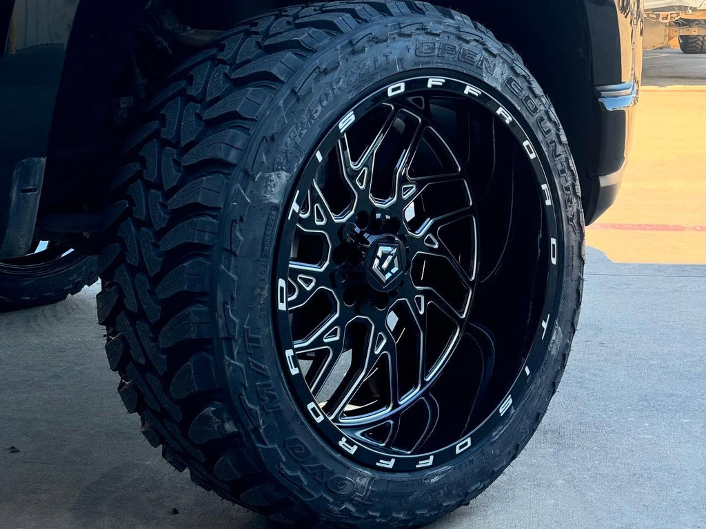 24X12 TIS 544BM OFF-ROAD WHEELS WITH 8X180 AND -44 OFFSET - GLOSS BLACK & MILLED