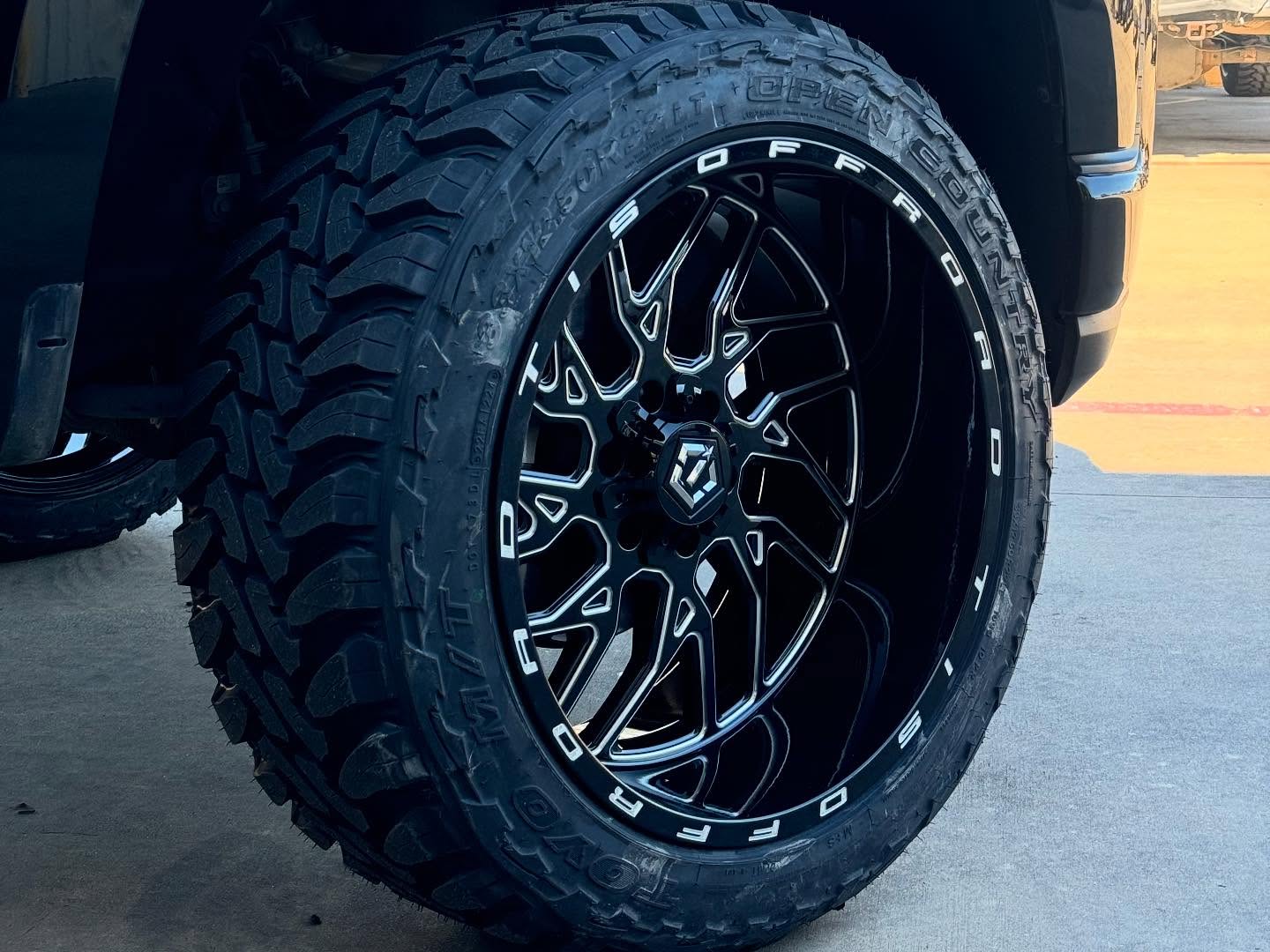 24X12 TIS 544BM OFF-ROAD WHEELS WITH 8X180 AND -44 OFFSET - GLOSS BLACK & MILLED