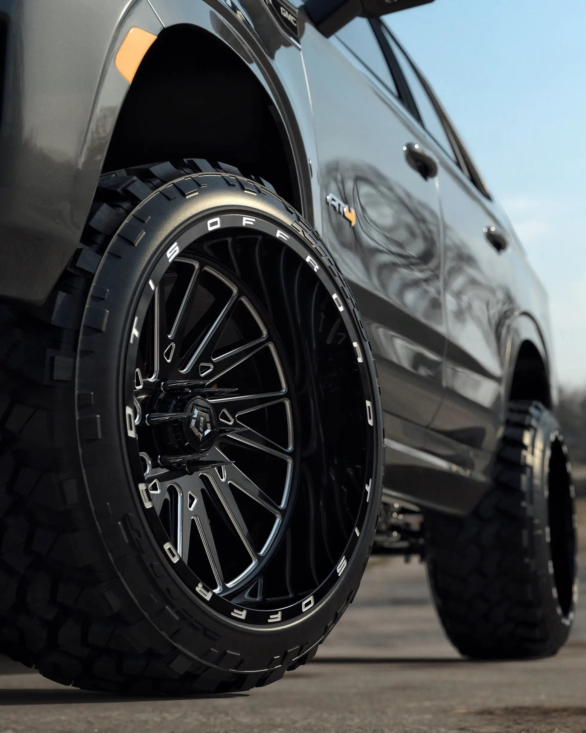 20X10 TIS 547BM OFF-ROAD WHEELS WITH 5X4.50/5X5.00 BOLT PATTERN AND -19 OFFSET - GLOSS BLACK & MILLED