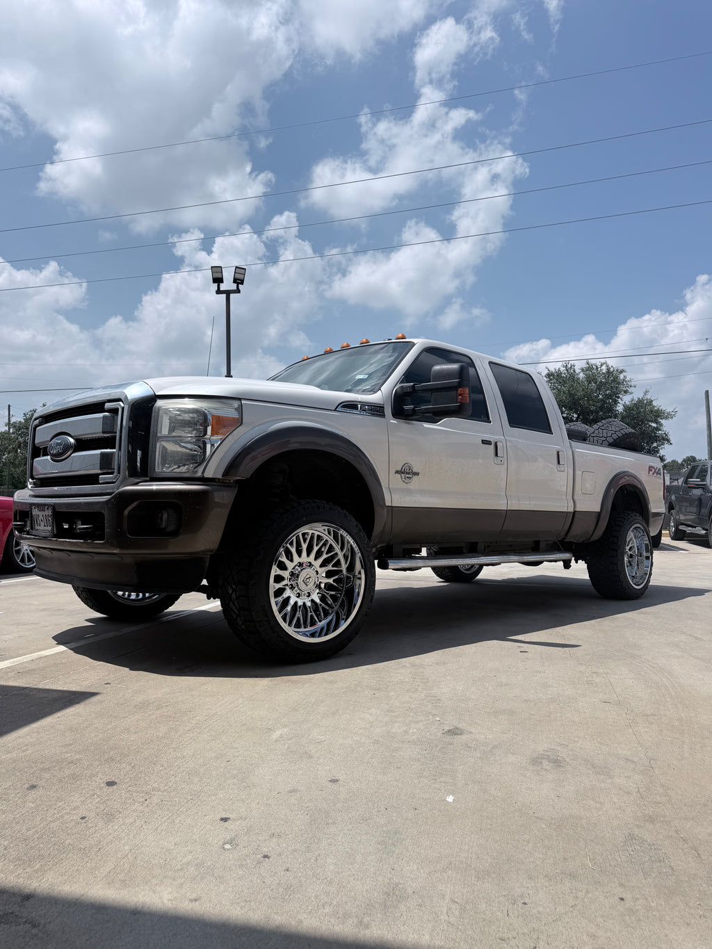 2009 - 2014 FORD F-350 WITH 22X12 AXE OFF-ROAD WHEELS, 33X12.50R22 AND 2.5" LEVELING KIT - GALLERY