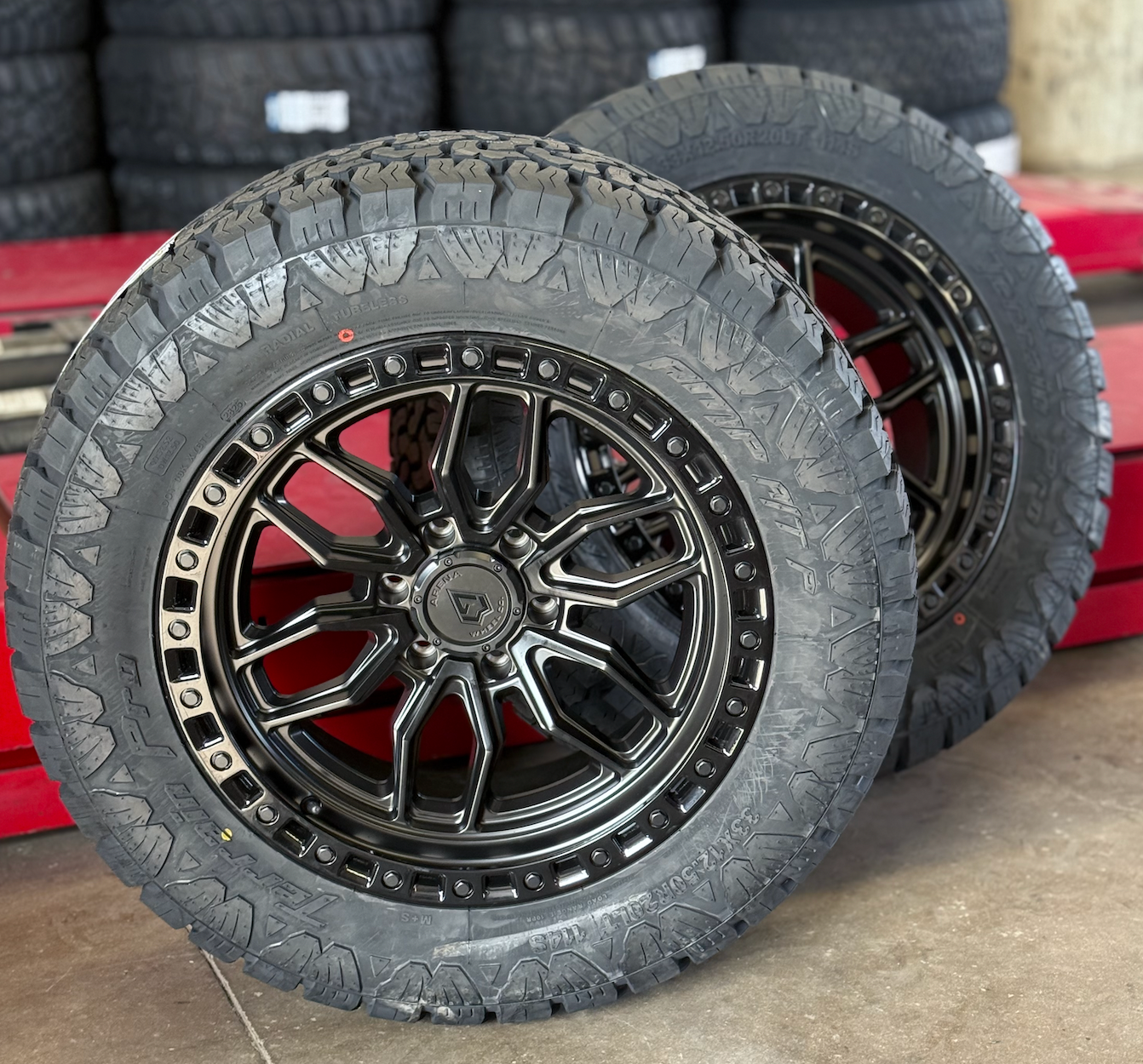 20X9 Arena Wheels 6X5.5/139.7 and 6x135 with 33x12.50R20 AMP Terrain Pro A/T Tires (Package)